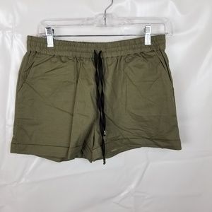 Against Nudity light olive green cotton short NWT